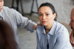 Close-up of a woman receiving emotional support during kratom detox in Nashville, TN at Nashville Wellness.