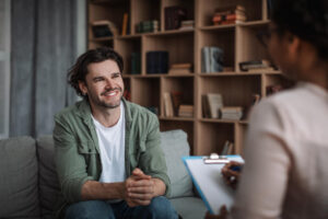 Man consulting with a psychologist during hallucinogen rehab in Nashville.