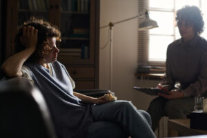 Young woman discussing her concerns with a counselor during designer drug abuse treatment in Nashville, TN.